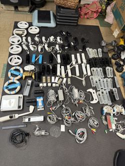 Nintendo Wii Remotes And Controllers And Accessories All For 350
