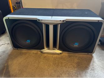 Two 10 inch Alpine  subs and Kicker amp