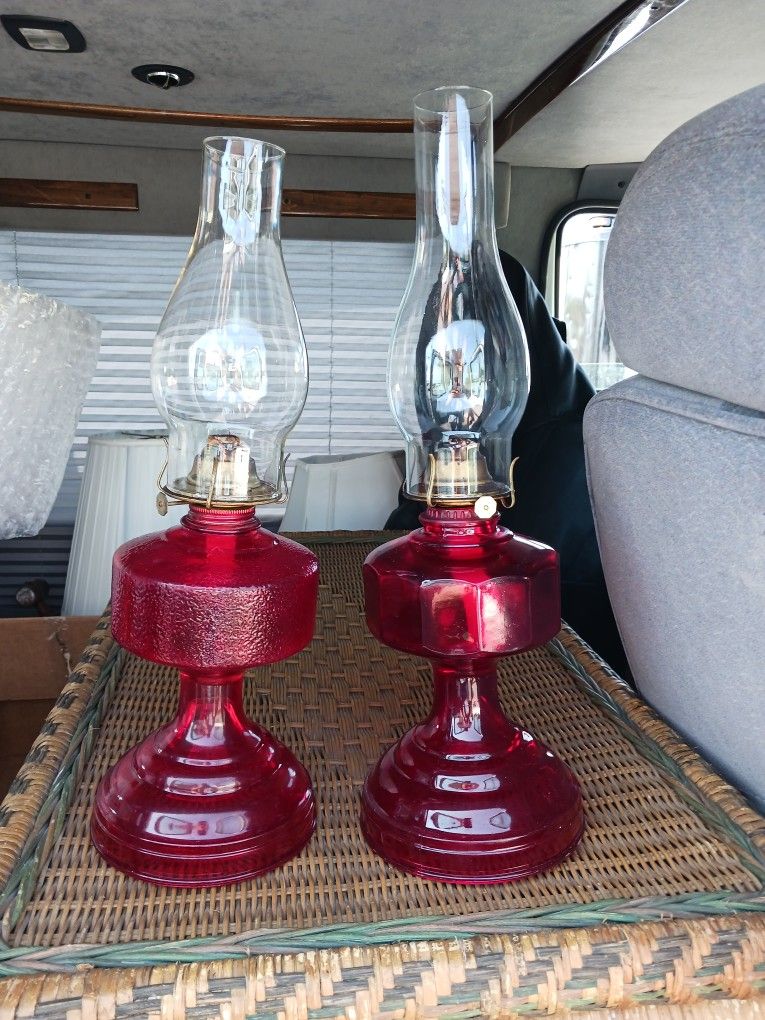 A PAIR OF  VINTAGE  RED  OIL LAMPS  WORK  GREAT  28 Dollars  EACH 