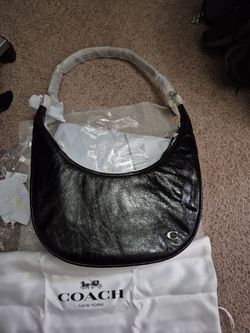 Coach Juliet Sling. AUTHENTIC.  NWT. Still in factory wrap. Dust bag included