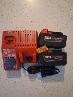 Milwaukee m18 2 battery xc5.0 and charger