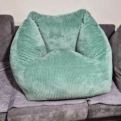 Plush foam cozy chair by Becky G