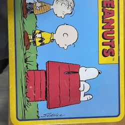 peanuts limited edition lunch box tin with hard candy. unopened