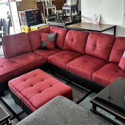 Red microfiber sectional couch and ottoman