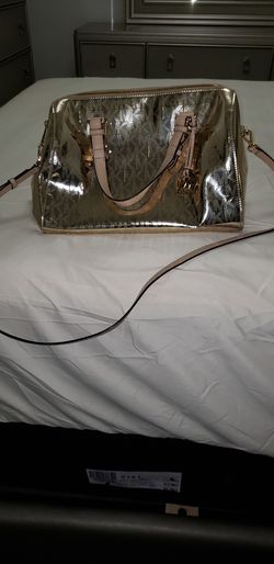 Michael Kors gold purse
