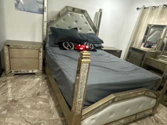 Bed with a set of bedside tables