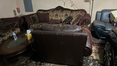 Dark Brown Ornate Sofa with Decorative Pillows