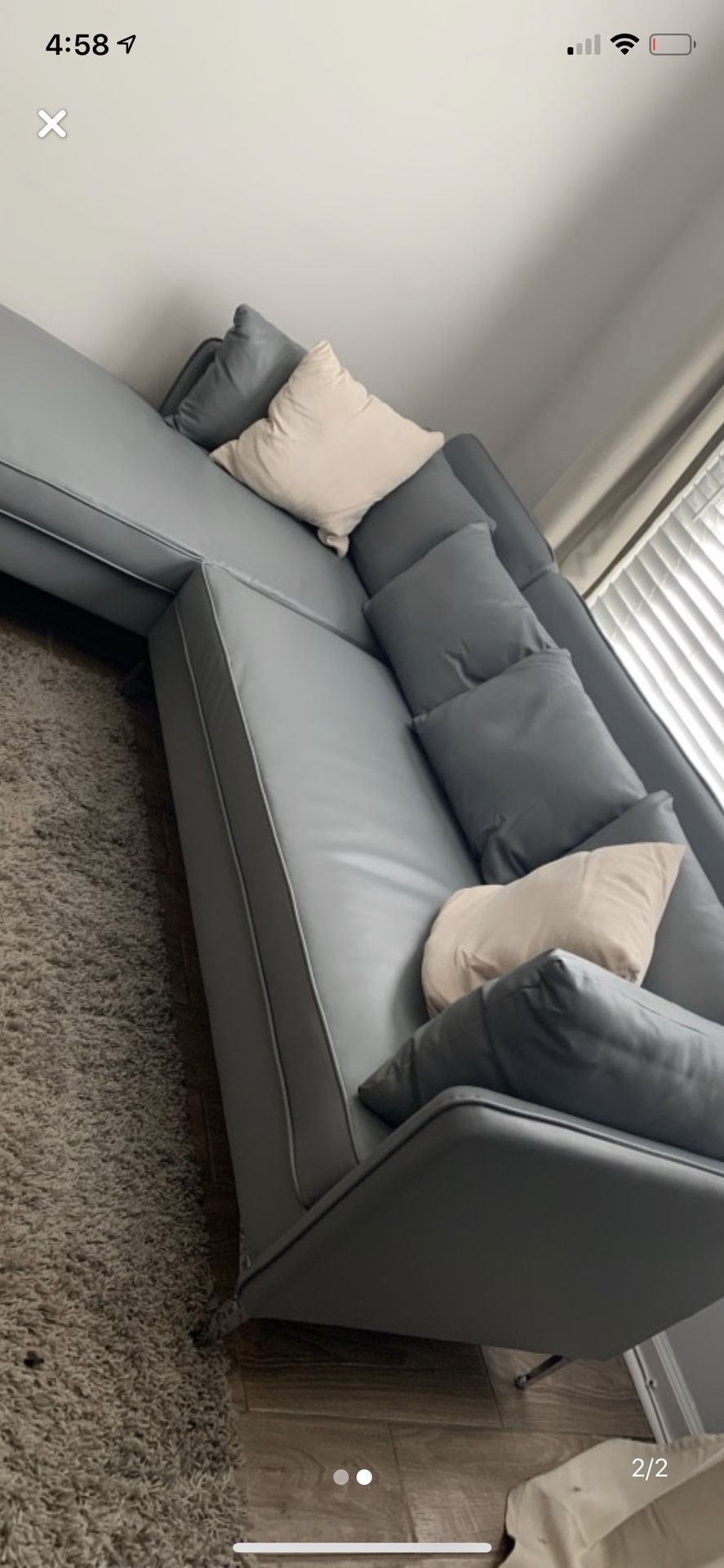 Gray faux leather couch