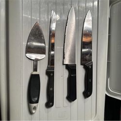 Three Carving Knives and a Cake Slicer