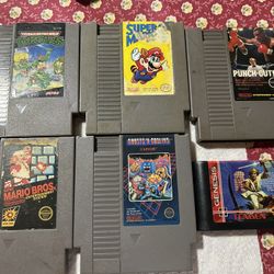 5 Nintendo games and 1 game sega 