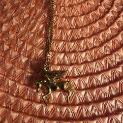 Gold plated chain with horse charms