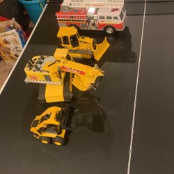 4 Tonka Trucks