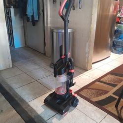 Small Bissell Vacuum With 1 Attatchment.  Works Great.  