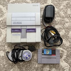 Super Nintendo Console With Super Mario World