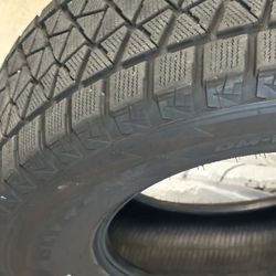 Bridgestone Blizzak DM-V2 Winter Tires – 265/70R17 (Set of 4) – Excellent Condition