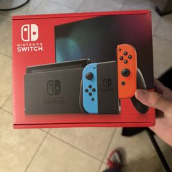 Nintendo Switch With Mario Kart and Super smash Bros