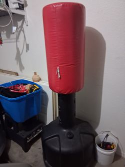 Freestanding Punching Bag with Base and 2 exercise bike