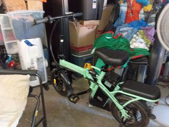 Electrical bike brand new with charger only used once has two speeds very fast one two three