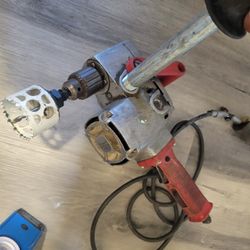 Hole Hawg With Chuck And Adapter
