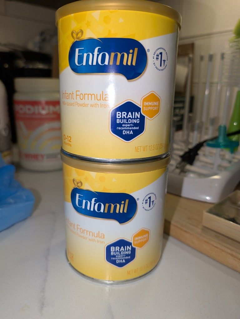Two Enfamil Cans