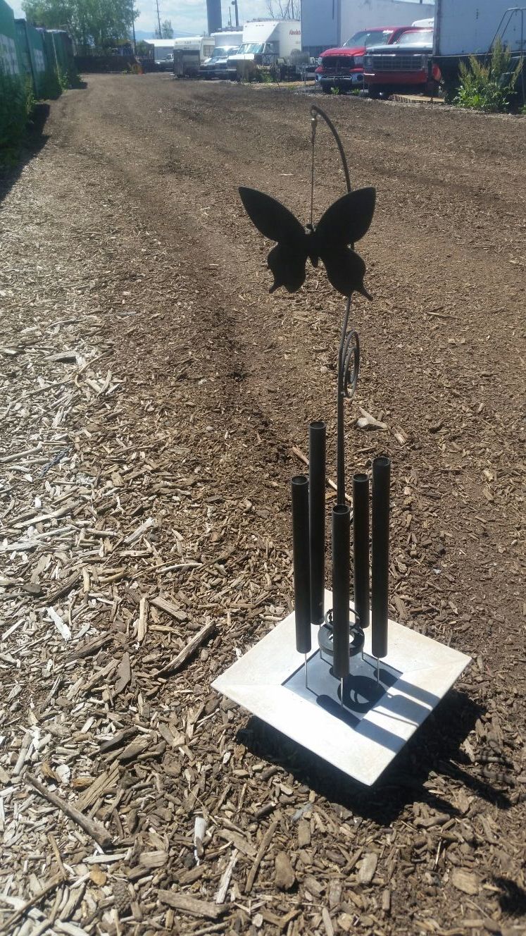 Beautiful butterfly wind chime for your yard or patio. Like new pd over 100 asking 25