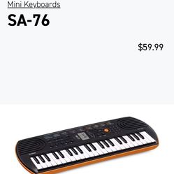 CASIO SA-76 Portable Keyboard Black/Orange with cable (retail $60)