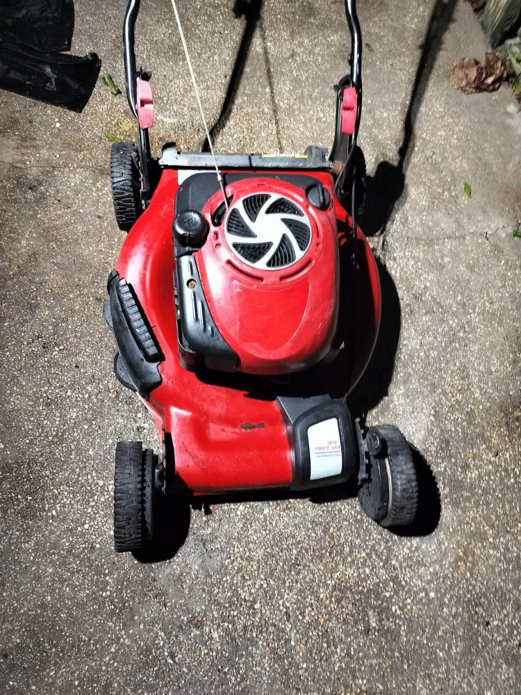 22" BIG WHEEL SELF PROPELLED CRAFTSMAN MOWER. SHARP BLADE, SIDE DISCH, ADJ WHEELS, WORKS GREAT.