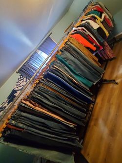 Clothing store out of business selling inventory racks jeans shirts skirts