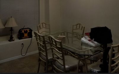 Glass/metal table and 6 chairs