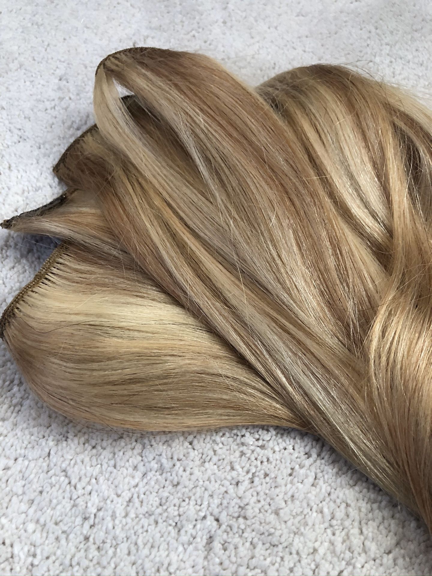 100% REMY HUMAN HAIR EXTENSIONS