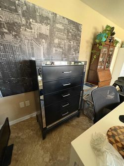 Modern Black 5-Drawer Chest with Mirrored Trim