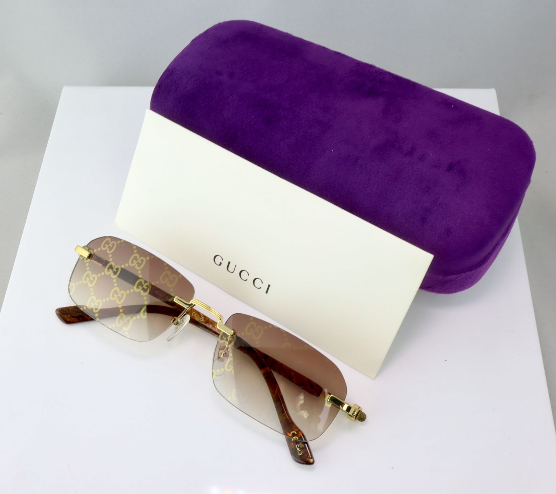 Gucci Rectangle Sunglasses in Gold With Brown GG Logo Lens