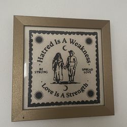„Love is a Strength" Framed Graphic Art - 33x33cm Gold Frame
