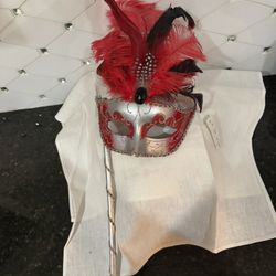 Red Masquerade Mask On A Stick