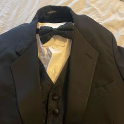 Black Tuxedo With Paisley Bow Tie And Paisley Vest 
