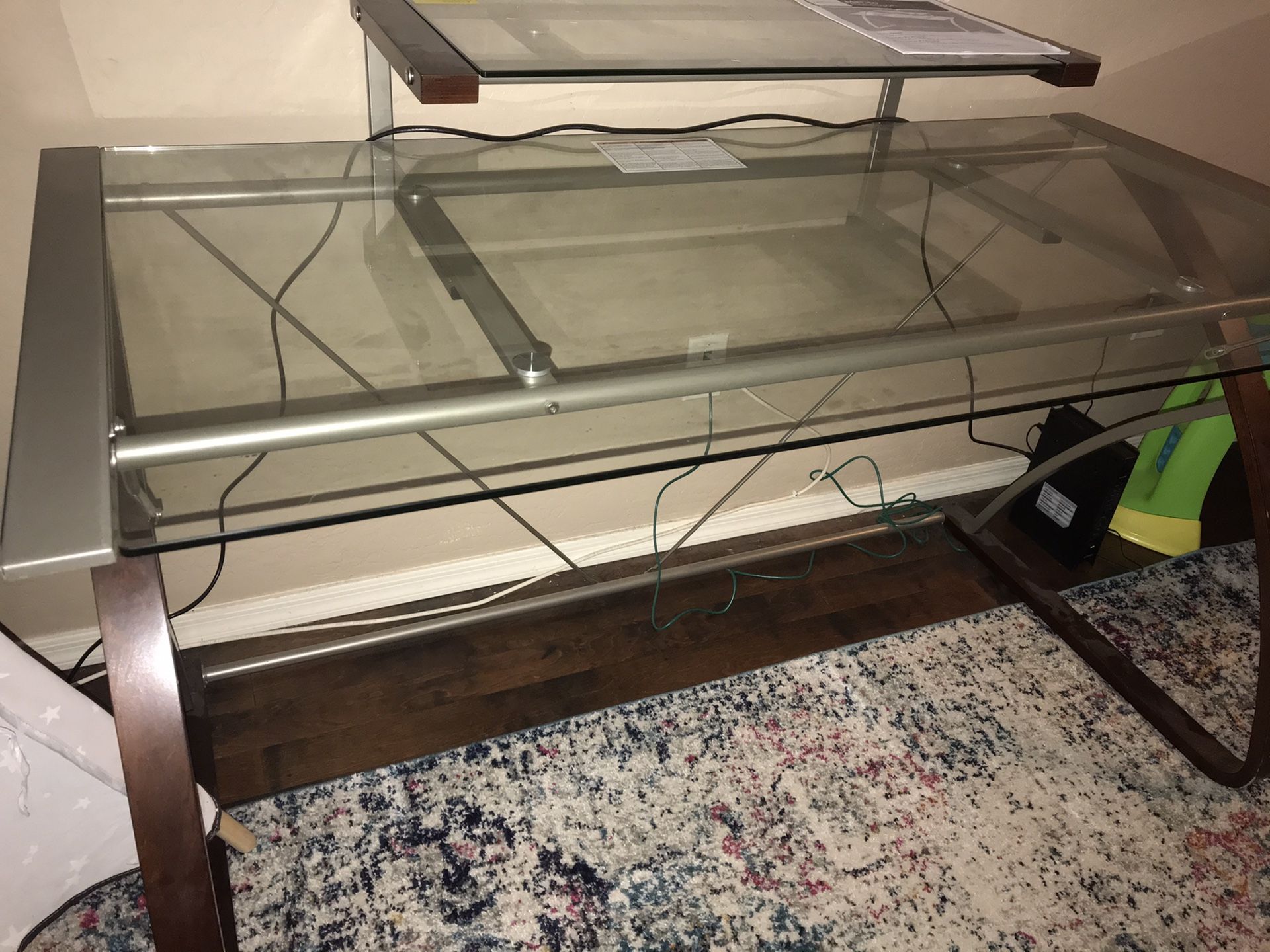 Glass desk - great condition $75 OBO. Dimensions: 55” in length, 27-5” wide, 36” tall.