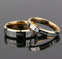 New Awesome Men’s and Women’s Forever Love couple rings your choice $25.00 each ring.Stamped 18k on inner band.Silver & Gold Tone. Men’s sizes 9,10,1