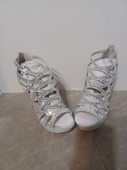 Silver woman, high heels size 8.