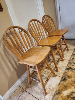 3 Sunset Trading Solid Oak Swivel Counter Stools