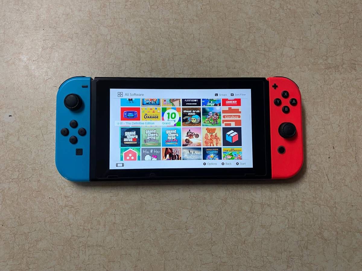 NINTENDO SWITCH V2 Loaded With 100 Popular Switch Games