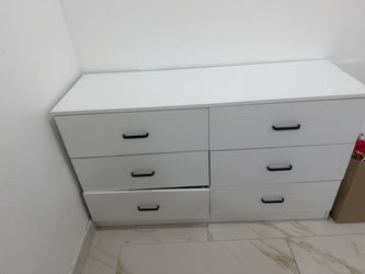 white dresser and bed full