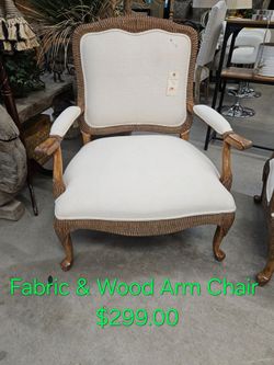 Fabric and Wood Accent Arm Chair We are located at 2811 East Bell road. Another Time Around Furniture.
