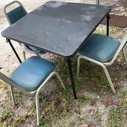 Table & 3 chairs $35 Located Mount Dora Fla 32757
