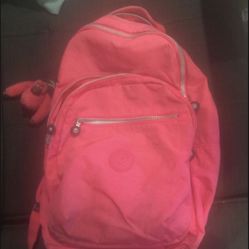 Hot pink Kipling laptop backpack