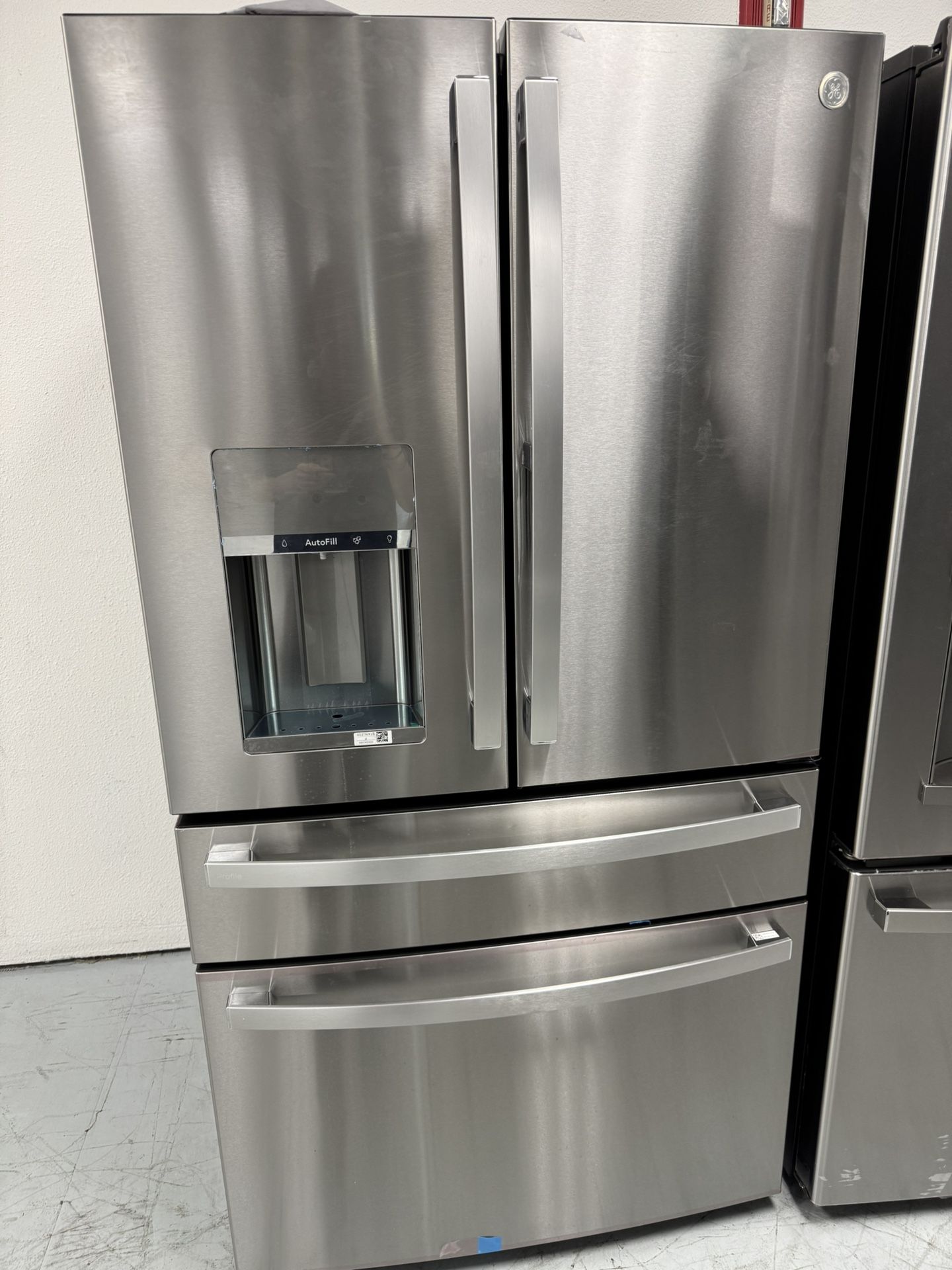 GE Profile 4-door Refrigerator With Auto Dispense Water And Convert Drawer