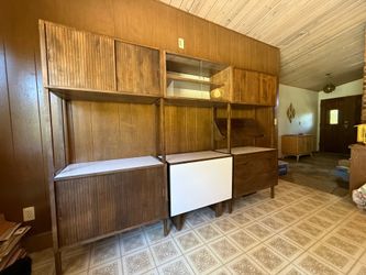 1960s mid-century modern three Bay wall unit with integrated rollout table