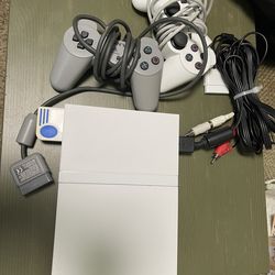 PS1 cord, memory card and 2 controllers