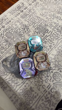 Pokemon Triple Whammy Tins x4