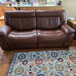 Leather sofa double recliners and headrests