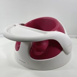 Mamas & Papas Baby Snug floor seat with a removable activity tray. 